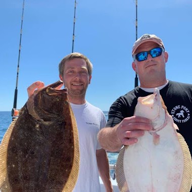 a person holding a fish