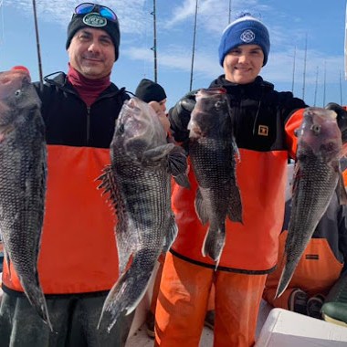a person holding a fish