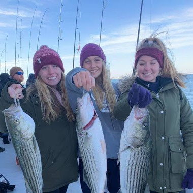 a group of people posing for the camera