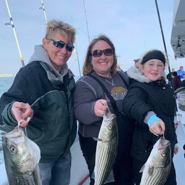 a person holding a fish