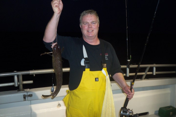 a person standing posing for the camera